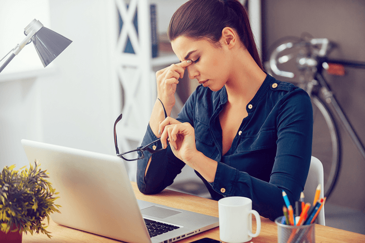 Woman stressed out at computer